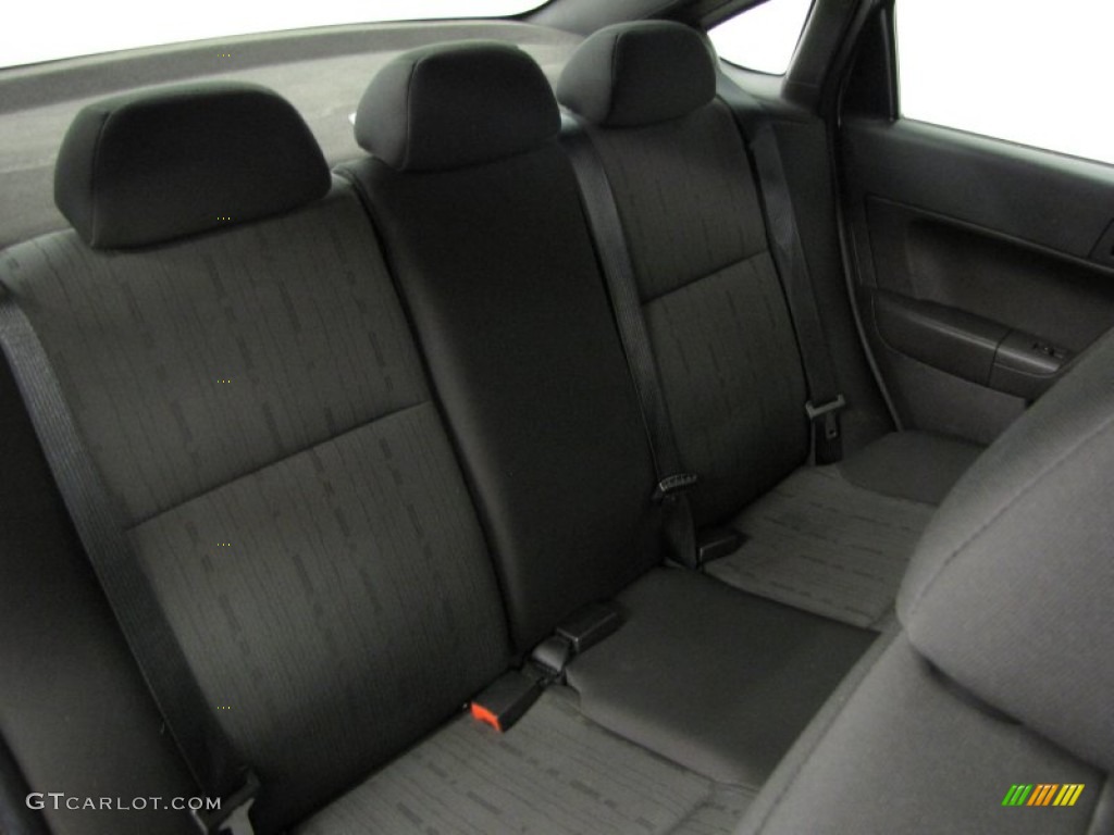 2010 Focus SE Sedan - Ingot Silver Metallic / Charcoal Black photo #8