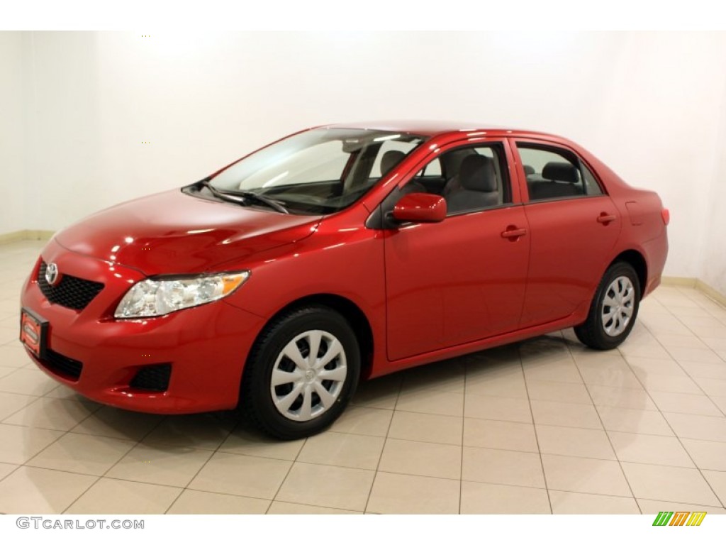 Barcelona Red Metallic 2010 Toyota Corolla LE Exterior Photo #80707428