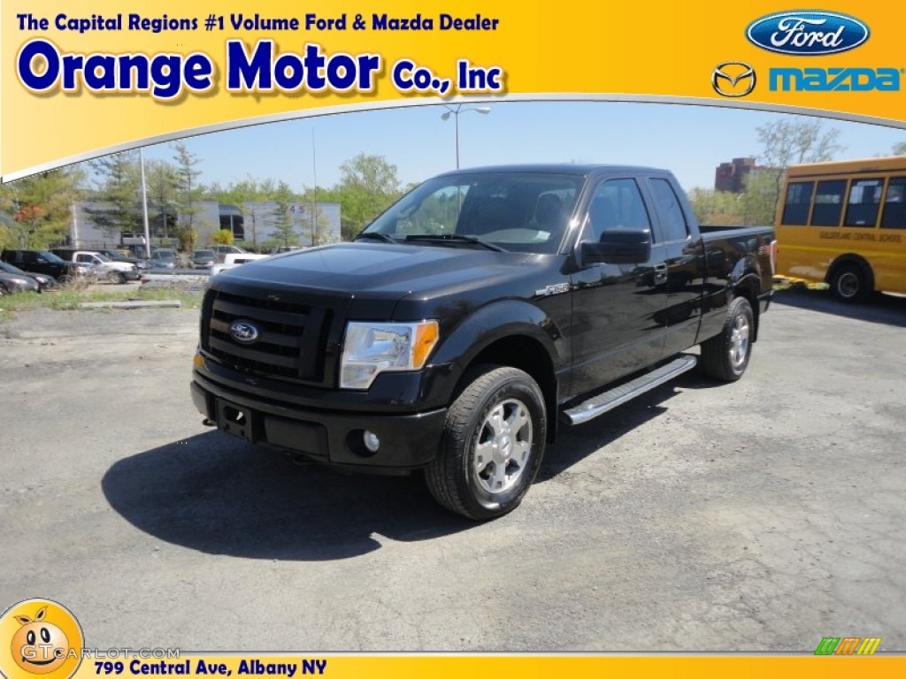 2010 F150 STX SuperCab 4x4 - Tuxedo Black / Medium Stone photo #1