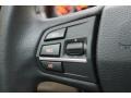 Oyster/Black Controls Photo for 2011 BMW 5 Series #80771458