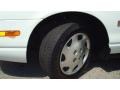 2000 Saturn S Series SL1 Sedan Wheel and Tire Photo