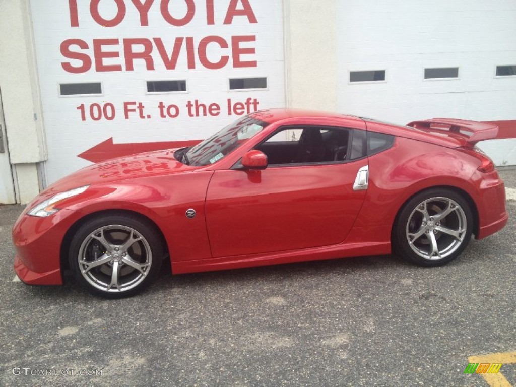 Solid Red 2009 Nissan 370Z NISMO Coupe Exterior Photo #80893360