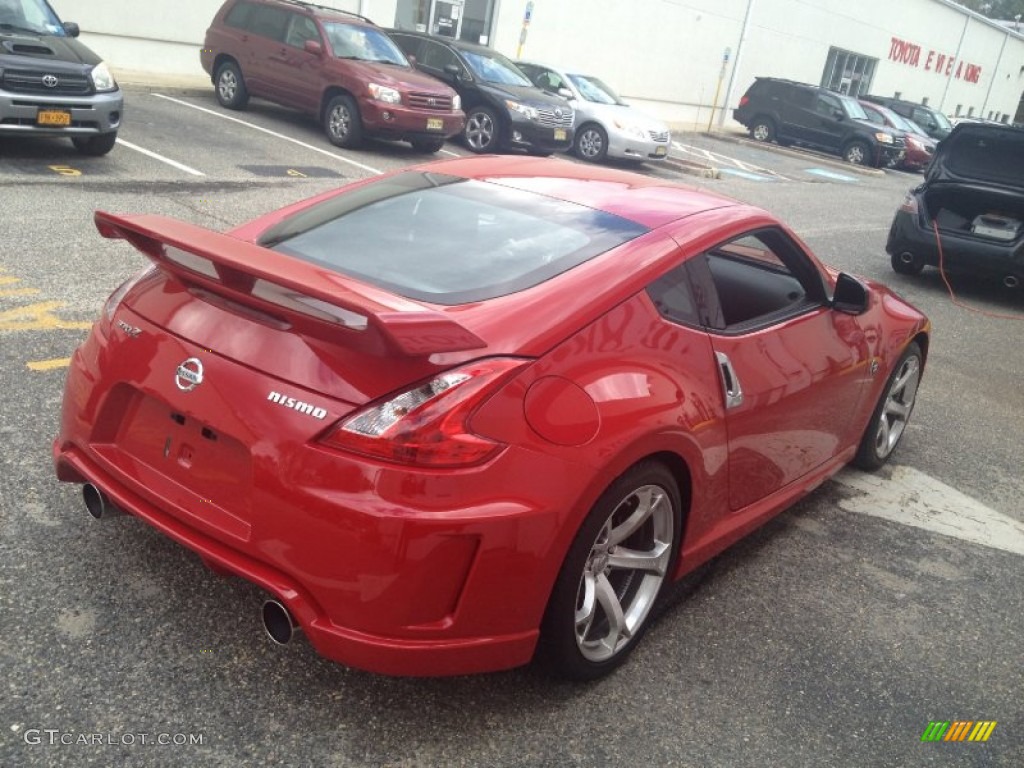 Solid Red 2009 Nissan 370Z NISMO Coupe Exterior Photo #80893379