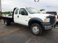 Front 3/4 View of 2006 F550 Super Duty XL SuperCab 4x4 Stake Truck
