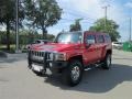 2009 Victory Red Hummer H3   photo #3