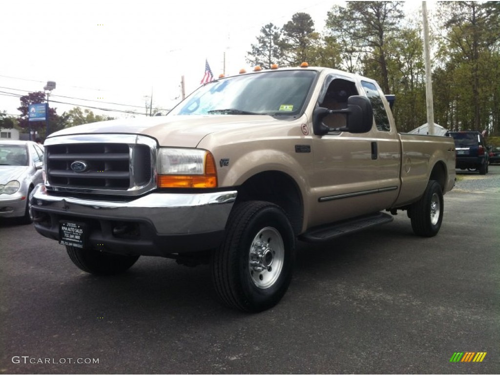 1999 F250 Super Duty XLT Extended Cab 4x4 - Light Prairie Tan Metallic / Medium Prairie Tan photo #1