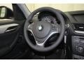 Black 2014 BMW X1 sDrive28i Steering Wheel