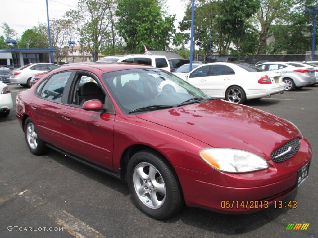 Matador Red Metallic 2002 Ford Taurus SE Exterior Photo #81045871