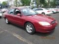 2002 Matador Red Metallic Ford Taurus SE  photo #3