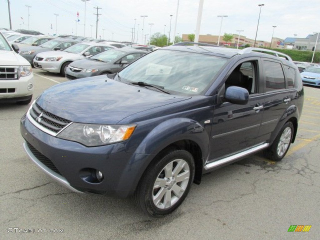 2009 Outlander SE 4WD - Deep Blue Metallic / Black photo #6