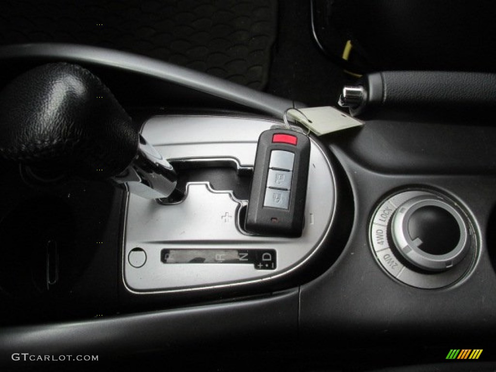 2009 Outlander SE 4WD - Deep Blue Metallic / Black photo #14