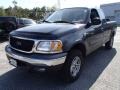 Black 2003 Ford F150 Heritage Edition Supercab 4x4