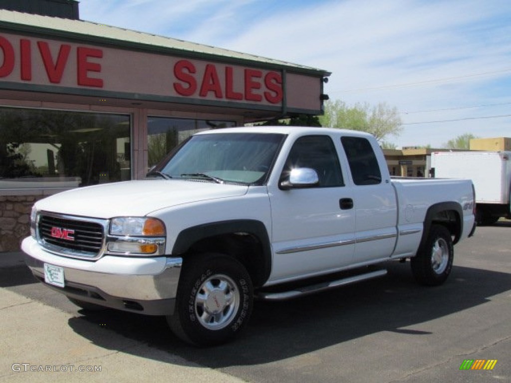 1999 Sierra 1500 SLE Extended Cab 4x4 - Summit White / Oak photo #1