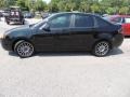 2011 Ebony Black Ford Focus SES Sedan  photo #2