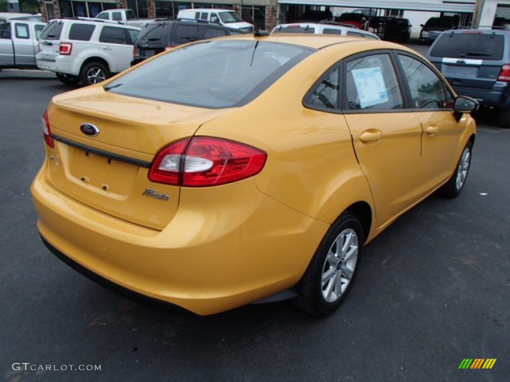 Yellow Blaze Metallic Tri-coat 2012 Ford Fiesta SEL Sedan Exterior Photo #81198518