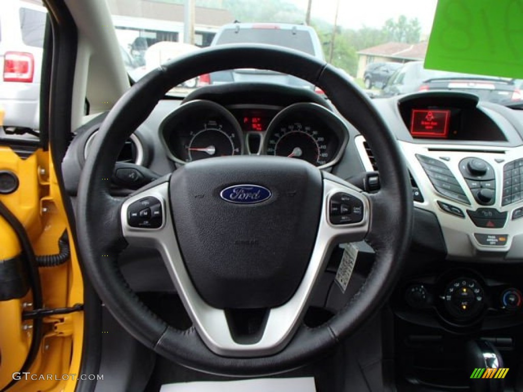 2012 Ford Fiesta SEL Sedan Charcoal Black Steering Wheel Photo #81198714