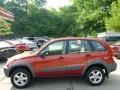 2001 Impulse Red Toyota RAV4 4WD  photo #2