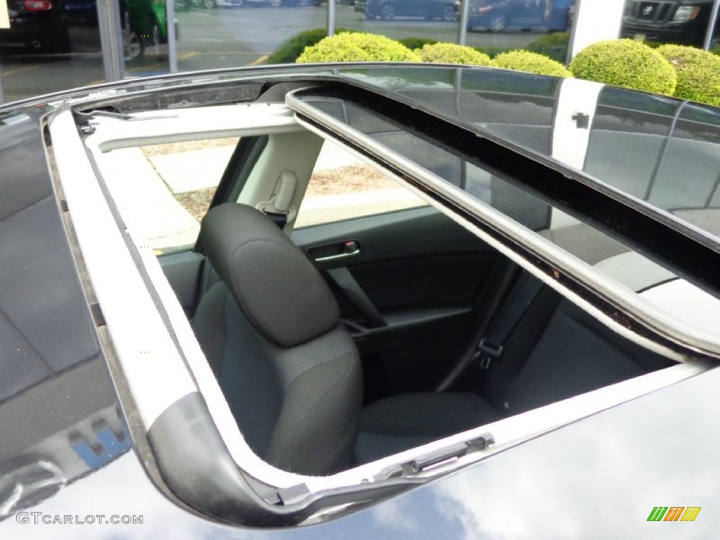 2010 MAZDA3 i Touring 4 Door - Black Mica / Black photo #31