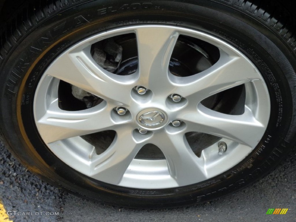 2010 MAZDA3 i Touring 4 Door - Black Mica / Black photo #34