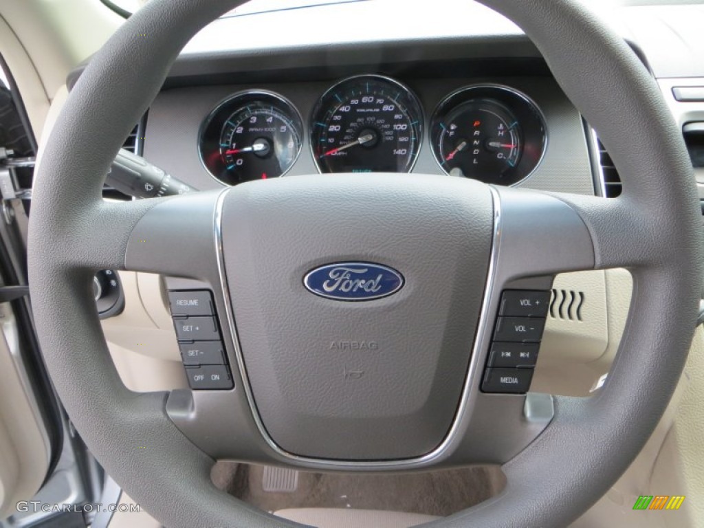 2010 Ford Taurus SE Light Stone Steering Wheel Photo #81258775