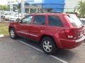 2010 Inferno Red Crystal Pearl Jeep Grand Cherokee Laredo  photo #2