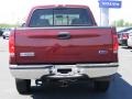 2005 Dark Toreador Red Metallic Ford F250 Super Duty Lariat Crew Cab 4x4  photo #25