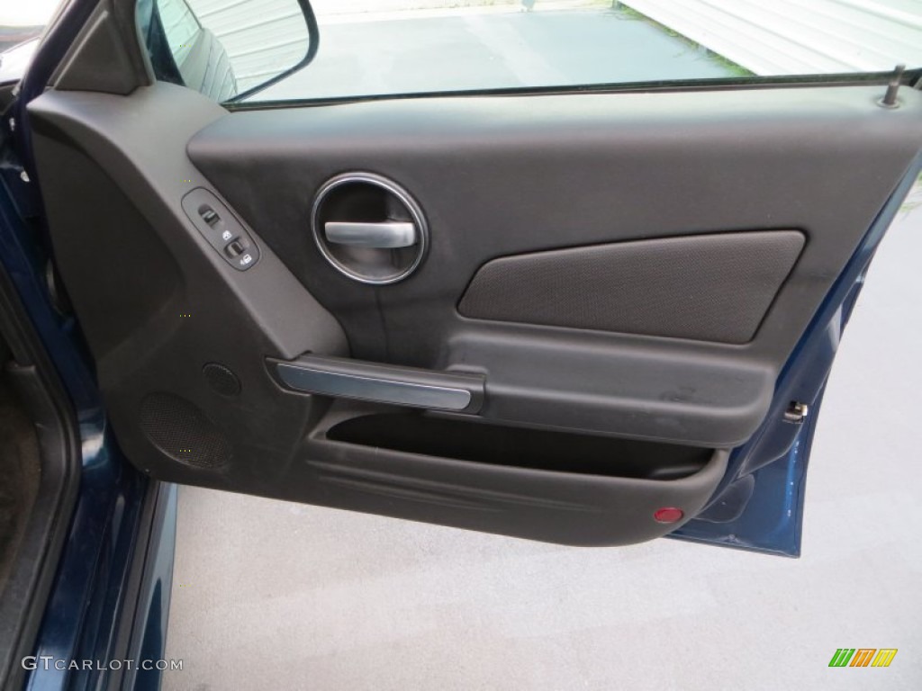 2006 Pontiac Grand Prix Sedan Ebony Door Panel Photo #81323416