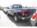 2002 True Blue Metallic Ford F150 XLT SuperCab 4x4  photo #3