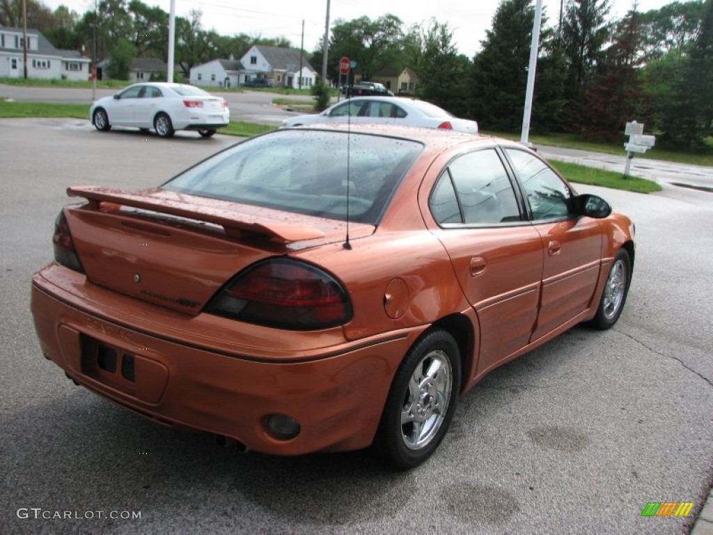 2004 Grand Am GT Sedan - Fusion Orange Metallic / Dark Pewter photo #5