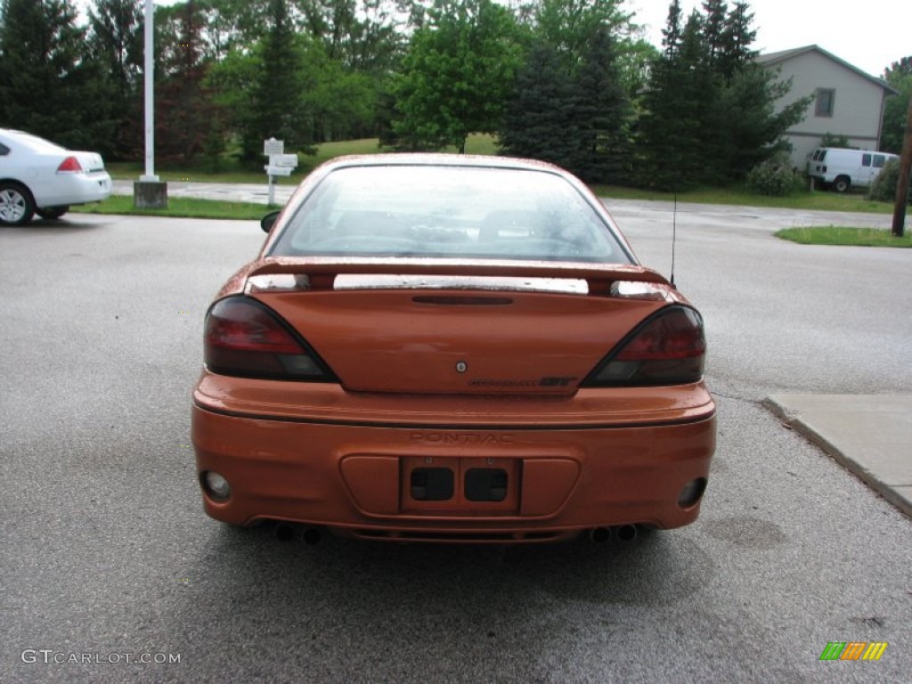 2004 Grand Am GT Sedan - Fusion Orange Metallic / Dark Pewter photo #6