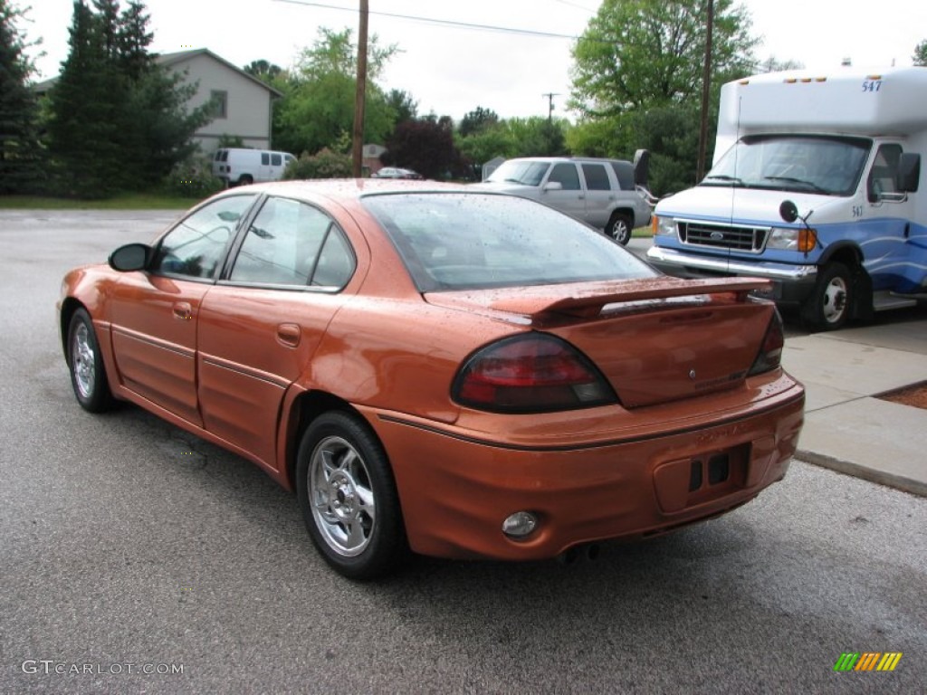 2004 Grand Am GT Sedan - Fusion Orange Metallic / Dark Pewter photo #7