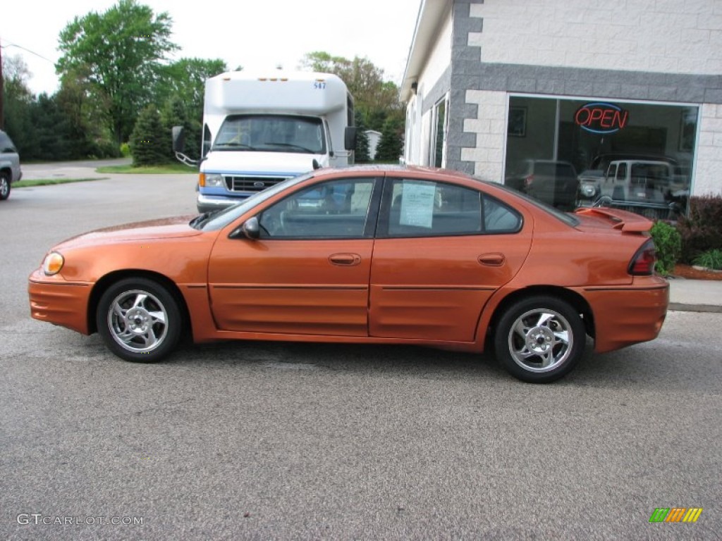 2004 Grand Am GT Sedan - Fusion Orange Metallic / Dark Pewter photo #8