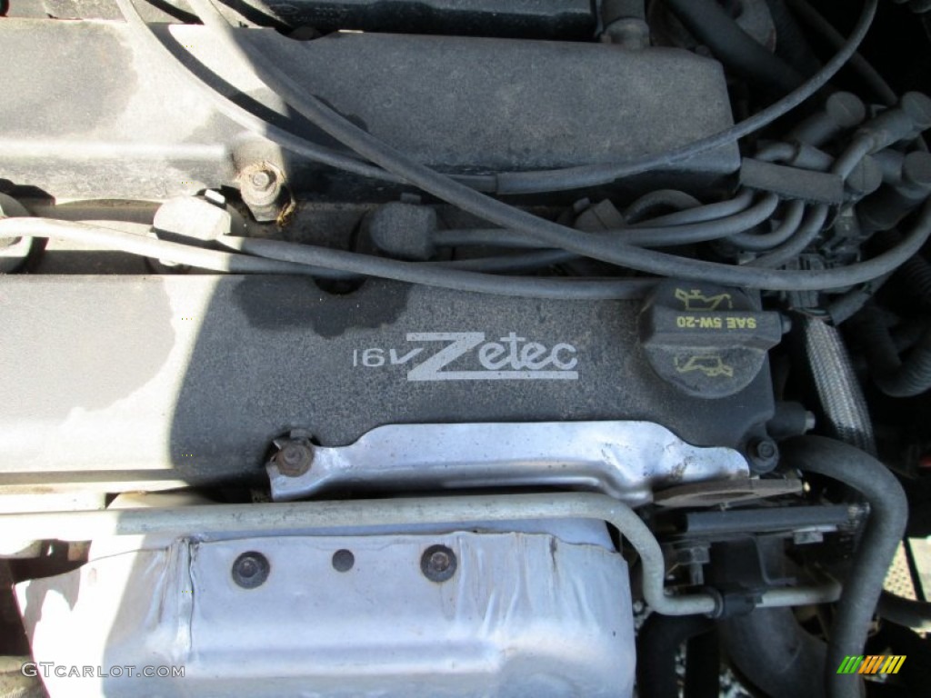 2003 Focus SE Sedan - Liquid Grey Metallic / Medium Graphite photo #15