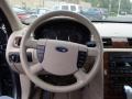 2005 Ford Five Hundred Pebble Beige Interior Steering Wheel Photo