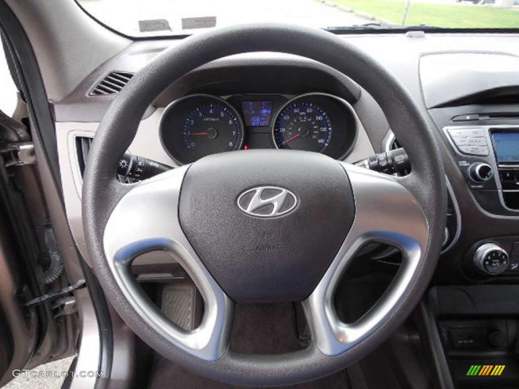 2011 Hyundai Tucson GL Taupe Steering Wheel Photo #81559260