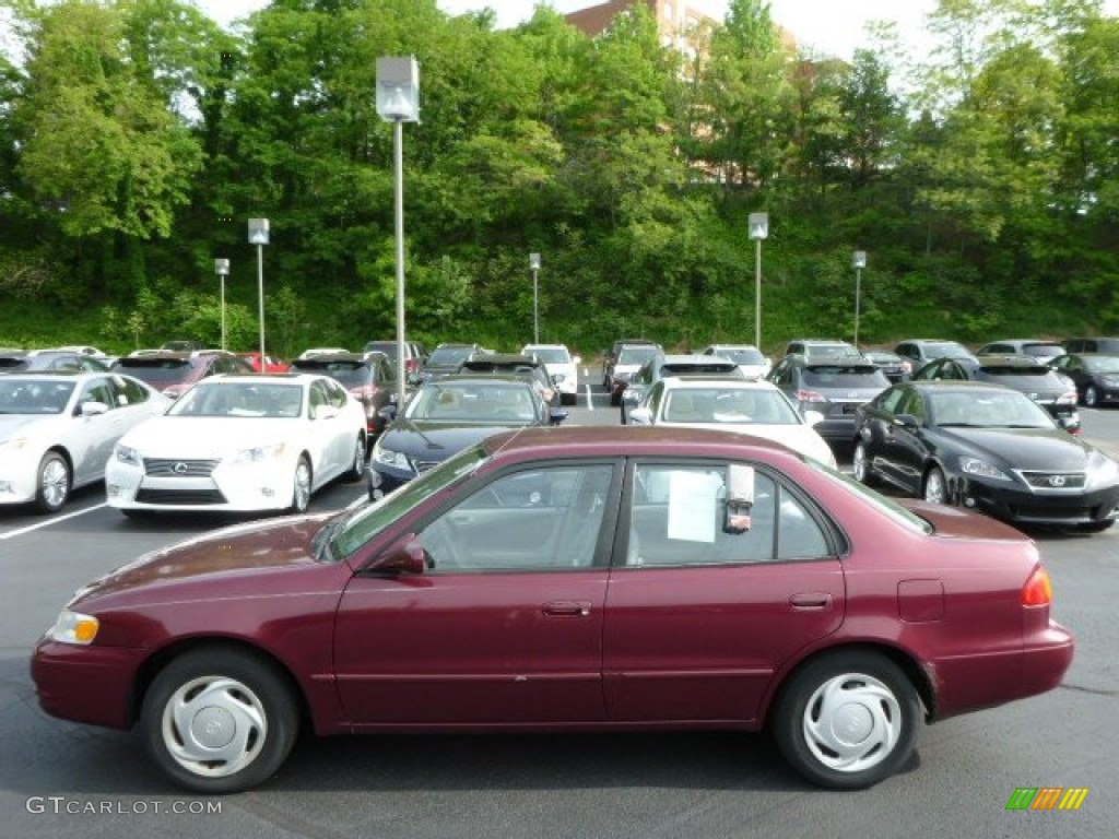 Ruby Red Pearl Metallic 1998 Toyota Corolla LE Exterior Photo #81561852