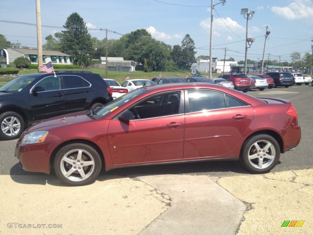Performance Red Metallic 2009 Pontiac G6 GT Sedan Exterior Photo #81587425