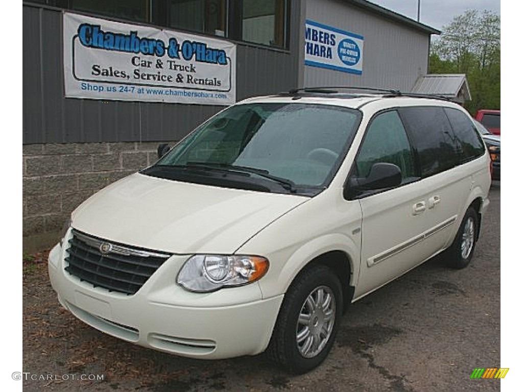 Cool Vanilla White Chrysler Town & Country