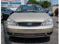 2006 Pueblo Gold Metallic Ford Focus ZX4 SES Sedan  photo #2