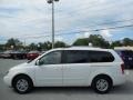 2012 Clear White Kia Sedona LX  photo #2