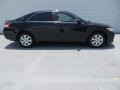 2010 Black Toyota Camry LE  photo #3