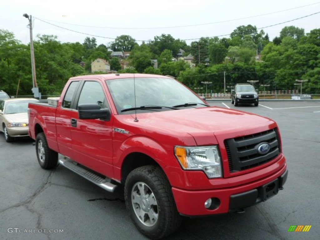 2010 F150 STX SuperCab 4x4 - Vermillion Red / Medium Stone photo #1