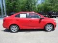 2013 Victory Red Chevrolet Sonic LT Sedan  photo #7