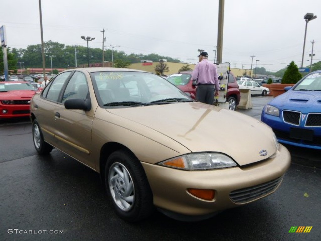 1998 Cavalier LS Sedan - Gold Metallic / Neutral photo #1