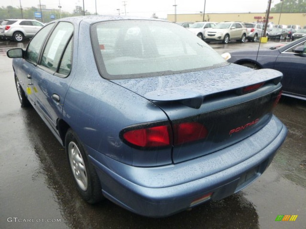 Bright Blue Aqua Metallic 1999 Pontiac Sunfire SE Sedan Exterior Photo #81997984