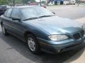 1997 Light Jade Gray Metallic Pontiac Grand Am SE Sedan #81988203