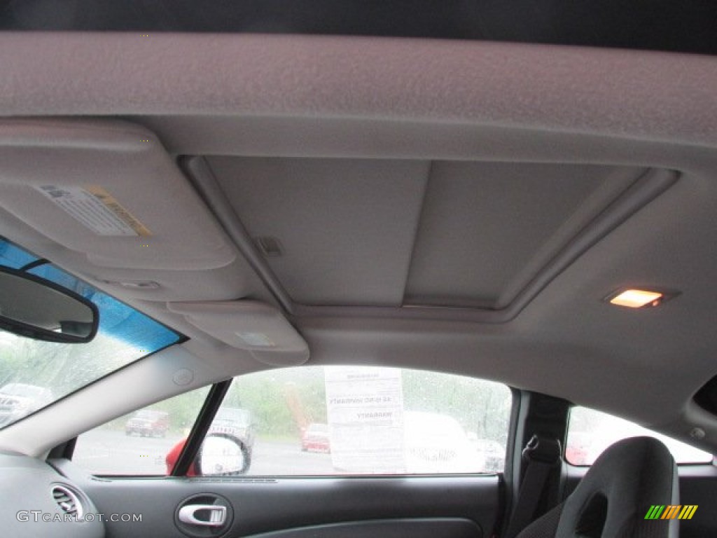 2009 Eclipse GS Coupe - Sunset Pearlescent Pearl / Dark Charcoal photo #9