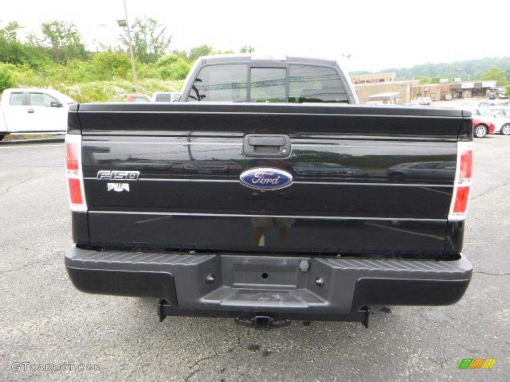 2010 F150 STX Regular Cab 4x4 - Tuxedo Black / Medium Stone photo #3