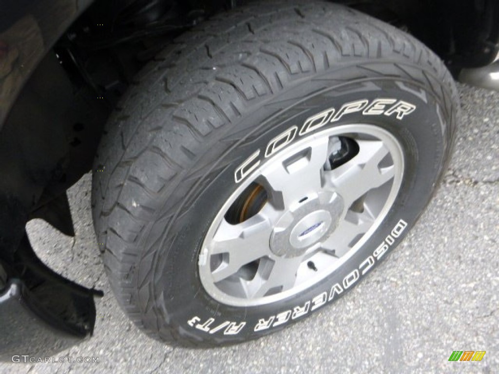 2010 F150 STX Regular Cab 4x4 - Tuxedo Black / Medium Stone photo #7