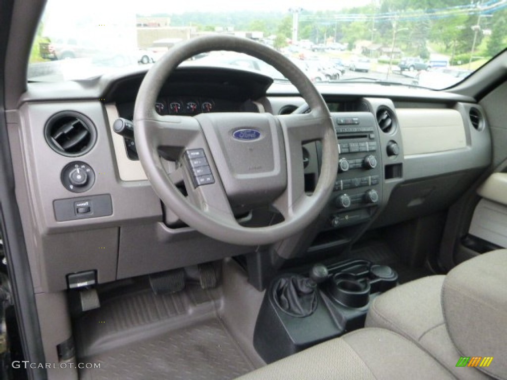 2010 F150 STX Regular Cab 4x4 - Tuxedo Black / Medium Stone photo #9